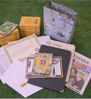Birth date original newspaper with birthday book and certificate